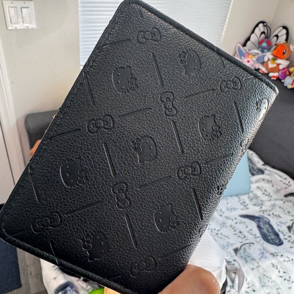 Hello Kitty Embossed Black Passport Cover